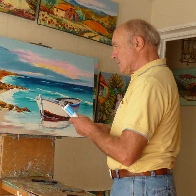 atelier de peinture un artiste peintre contemporain au couteau avec un tableau sur son chevalet